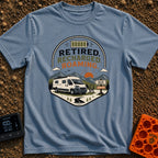 Retired But Recharged - T-Shirt in Blue Jean - A graphic badge depicting a white campervan parked in a mountainous...