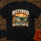 Scenic Route To Retirement - T-Shirt in Black - A vintage-style illustration of a white motorhome driving along a winding...
