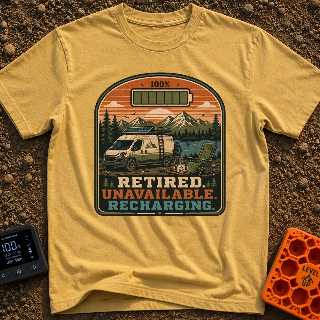 Retired And Recharging - T-Shirt in Mustard - A camper van equipped with roof-mounted solar panels is parked at a scenic...