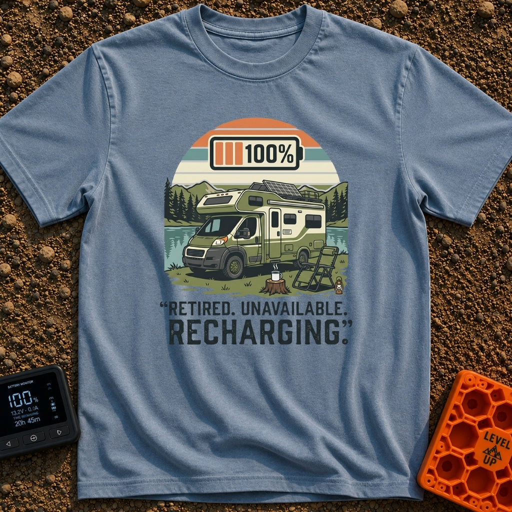 Retired And Recharging - T-Shirt in Blue Jean - A green Class C camper van with rooftop solar panels is parked by a lake...