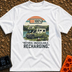 Retired And Recharging - T-Shirt in White - A green Class C camper van with rooftop solar panels is parked by a lake and...