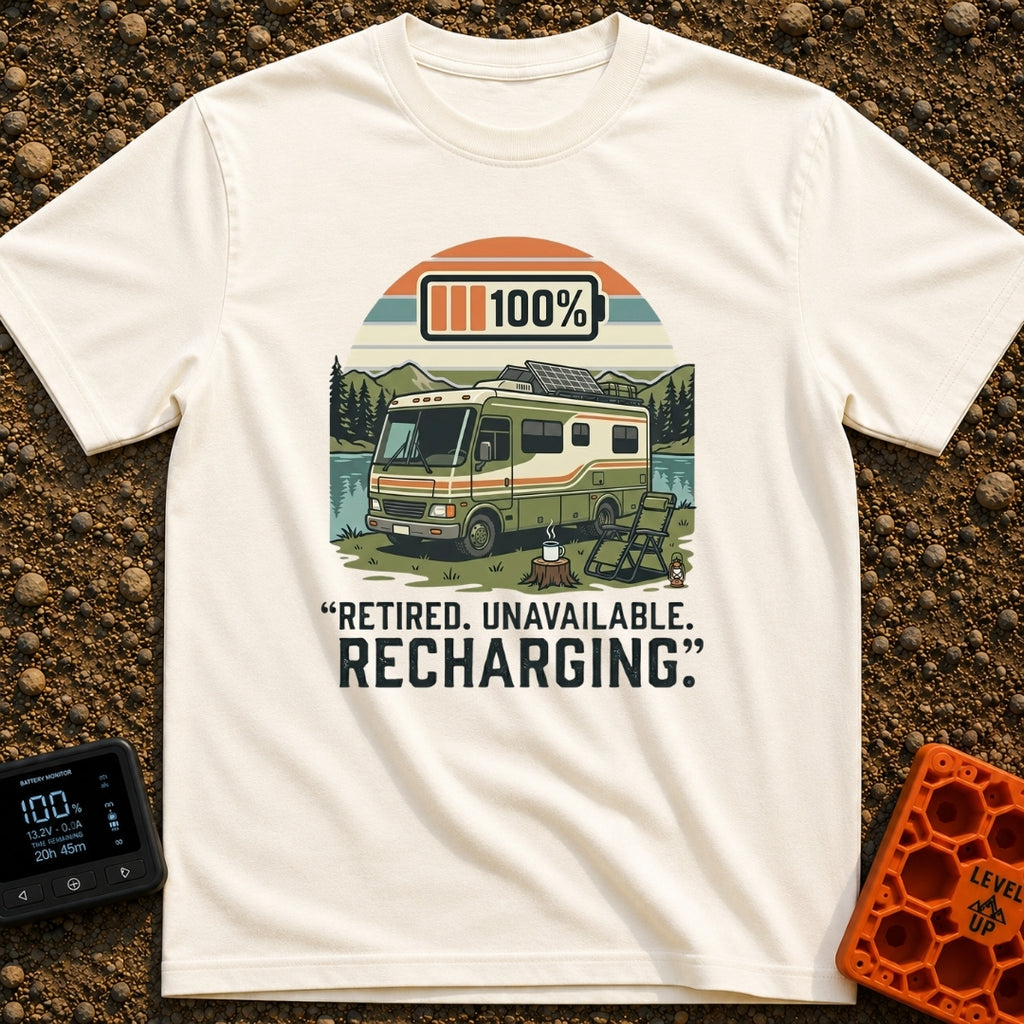 Recharging In Progress - T-Shirt in Ivory - An illustration of a green and white motorhome parked by a lake with...