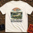Recharging In Progress - T-Shirt in Ivory - An illustration of a green and white motorhome parked by a lake with...