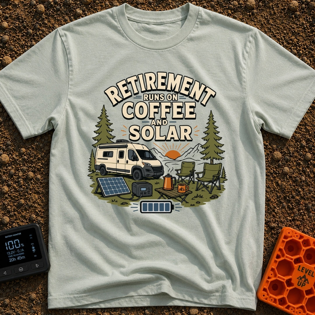 Solar Powered Retirement - T-Shirt in Bay - An illustration of a camper van parked in a mountainous, forested landscape...