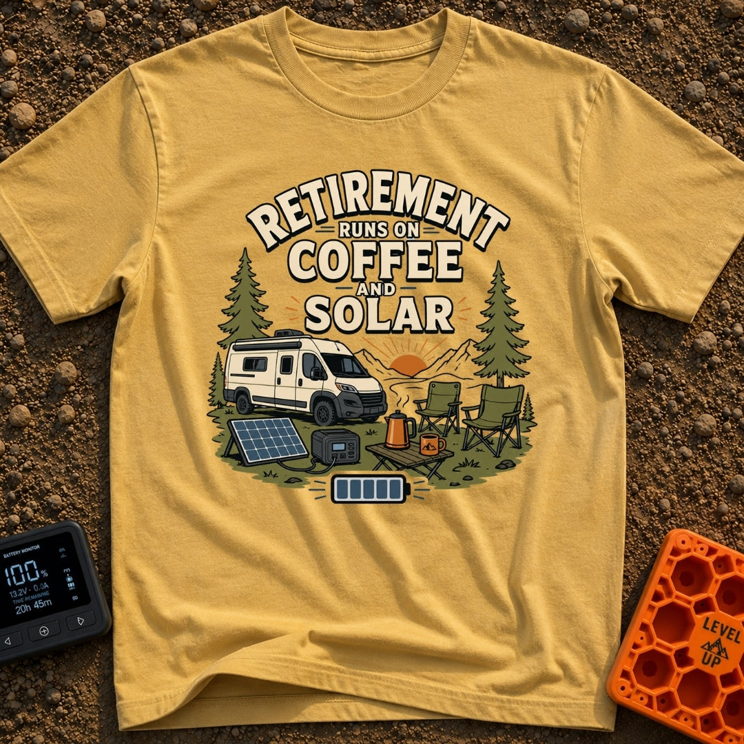 Solar Powered Retirement - T-Shirt in Mustard - An illustration of a camper van parked in a mountainous, forested...