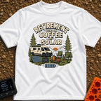 Solar Powered Retirement - T-Shirt in White - An illustration of a camper van parked in a mountainous, forested landscape...