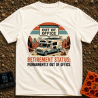 Permanently Out Of Office - T-Shirt in Ivory - A vintage-style motorhome is parked in a red rock desert canyon with solar...