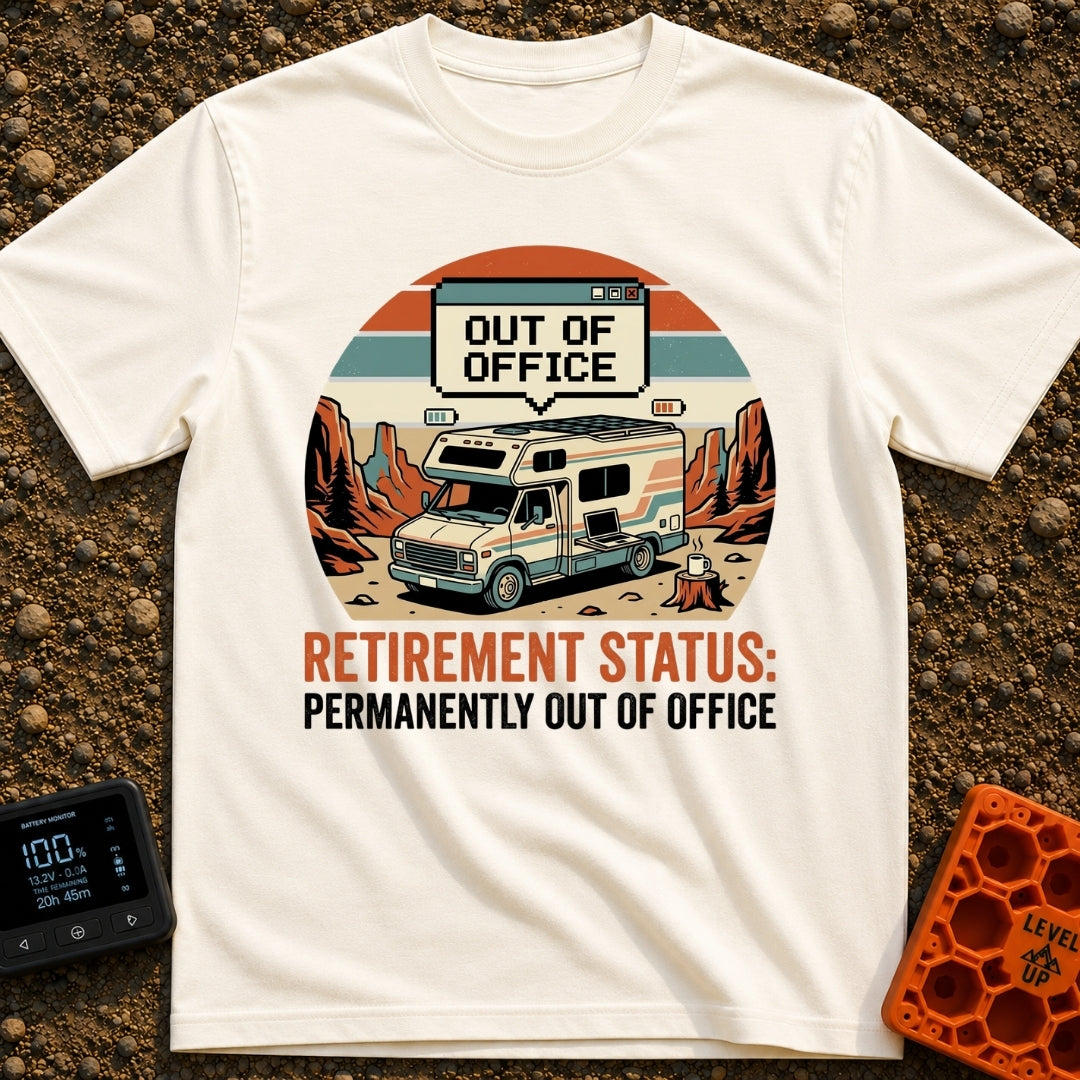 Permanently Out Of Office - T-Shirt in Ivory - A vintage-style motorhome is parked in a red rock desert canyon with solar...
