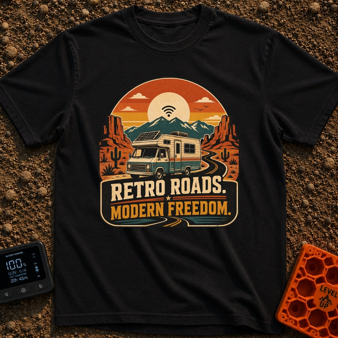 Wired In The Wild - T-Shirt in Black - A retro-style motorhome with a large solar panel on its roof drives along a...