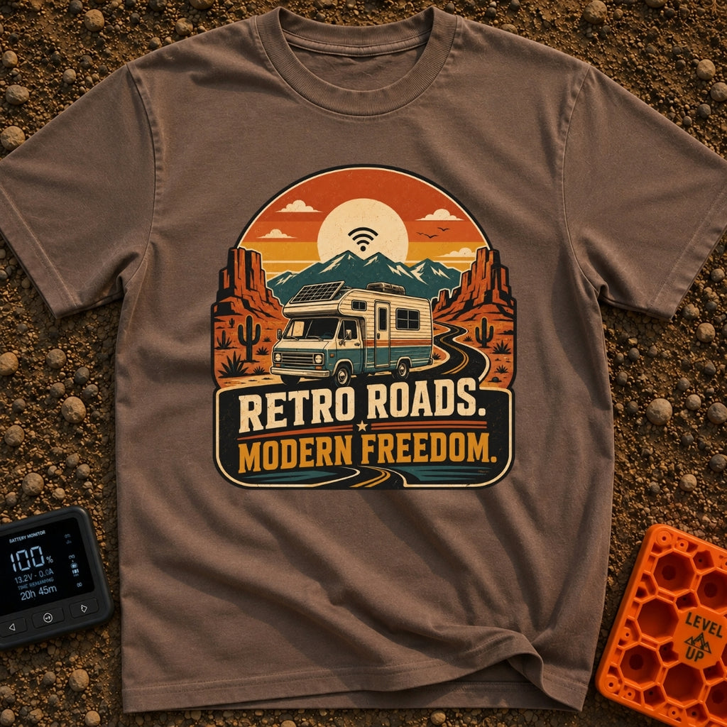 Wired In The Wild - T-Shirt in Espresso - A retro-style motorhome with a large solar panel on its roof drives along a...