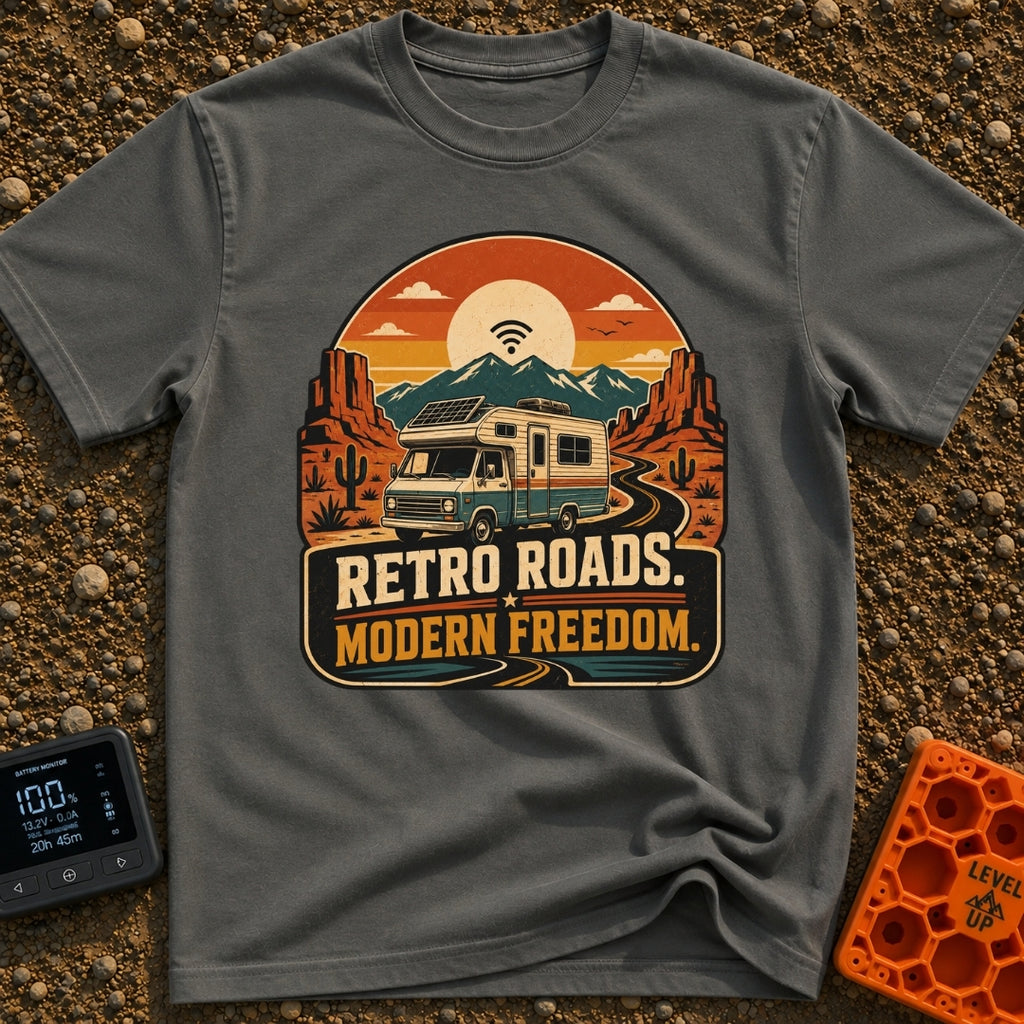 Wired In The Wild - T-Shirt in Pepper - A retro-style motorhome with a large solar panel on its roof drives along a...