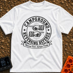 The Reversing Referee - T-Shirt in White - A circular, vintage-style badge graphic reading "CAMPGROUND" and "REVERSING...