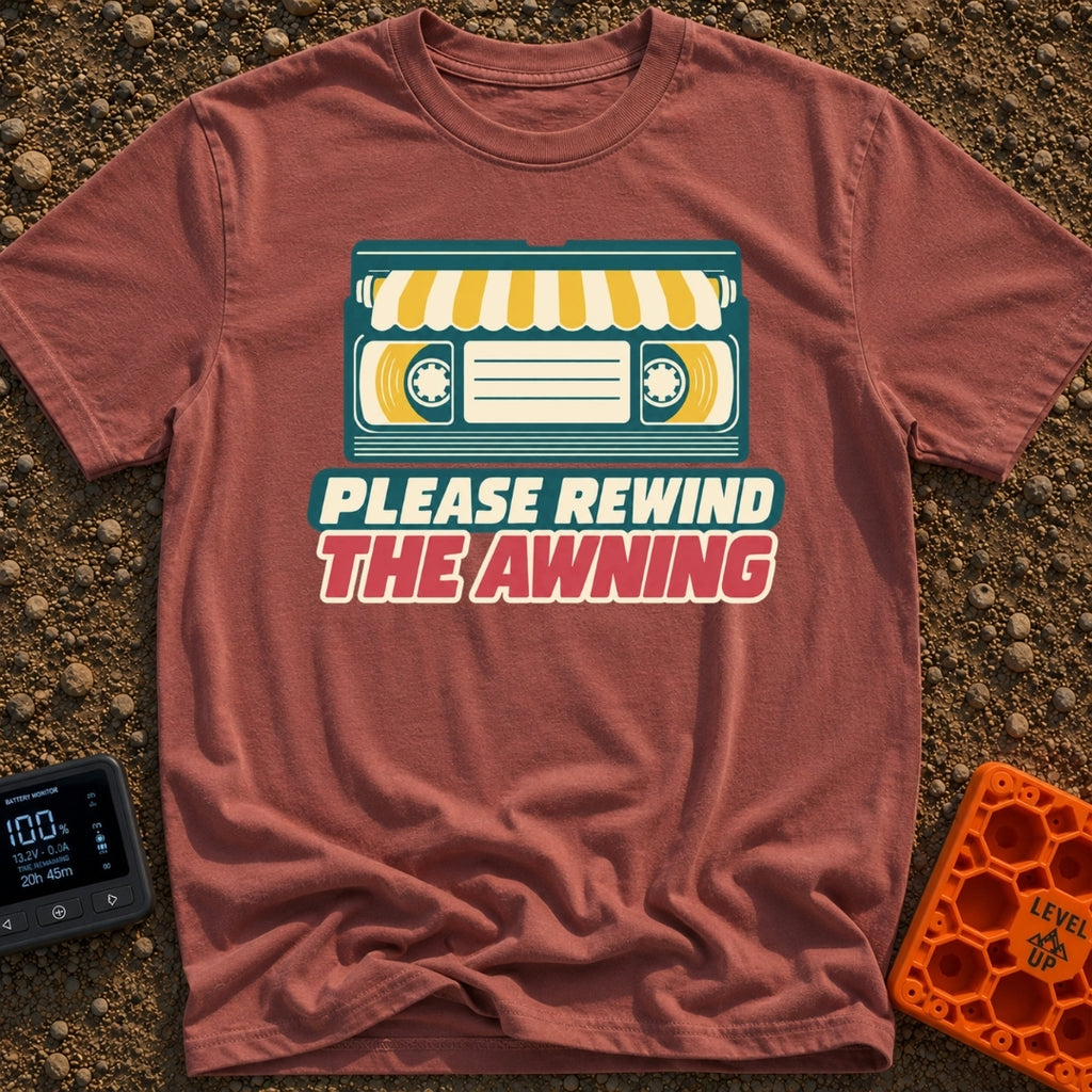 Be Kind Rewind Awning - T-Shirt in Brick - A retro illustration of a VHS cassette tape with a yellow and white striped...