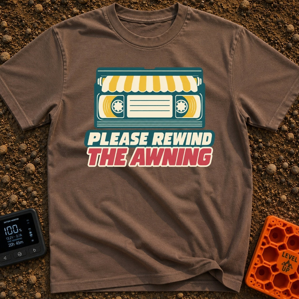 Be Kind Rewind Awning - T-Shirt in Espresso - A retro illustration of a VHS cassette tape with a yellow and white striped...