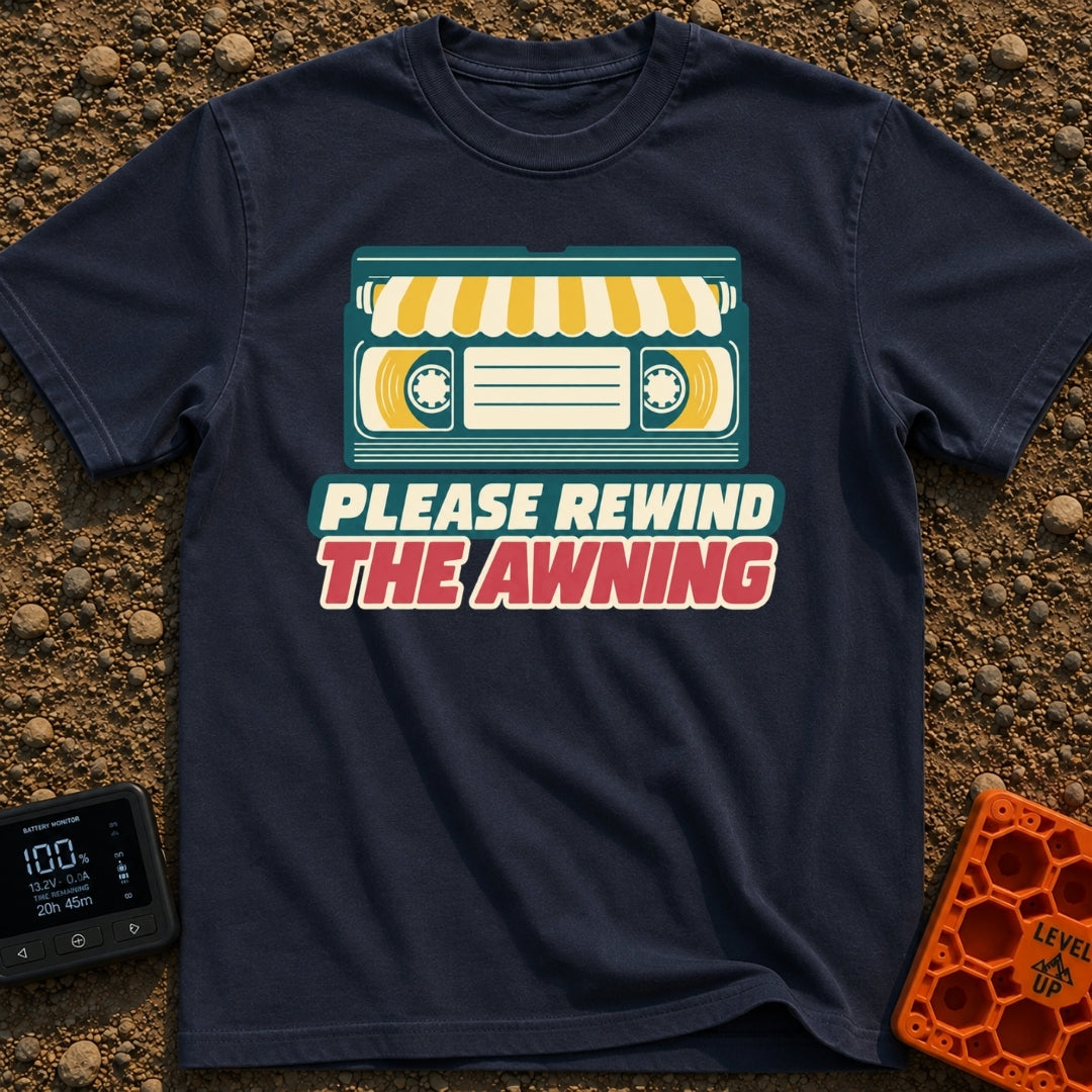 Be Kind Rewind Awning - T-Shirt in Navy - A retro illustration of a VHS cassette tape with a yellow and white striped...
