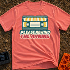 Be Kind Rewind Awning - T-Shirt in Watermelon - A retro illustration of a VHS cassette tape with a yellow and white...