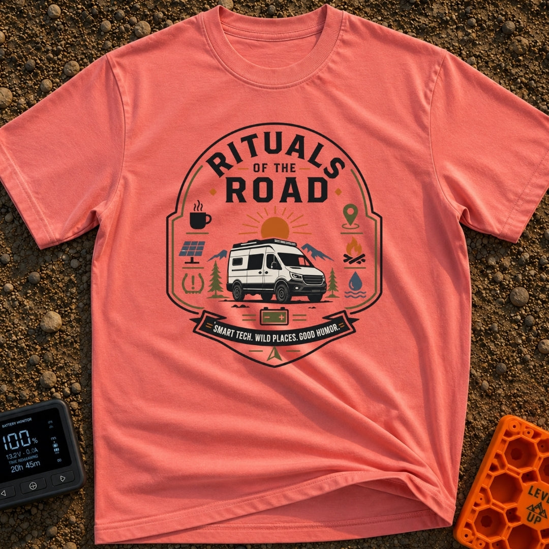Rituals Of The Road - T-Shirt in Watermelon - A crest-style design featuring a white camper van parked in front of a sun...
