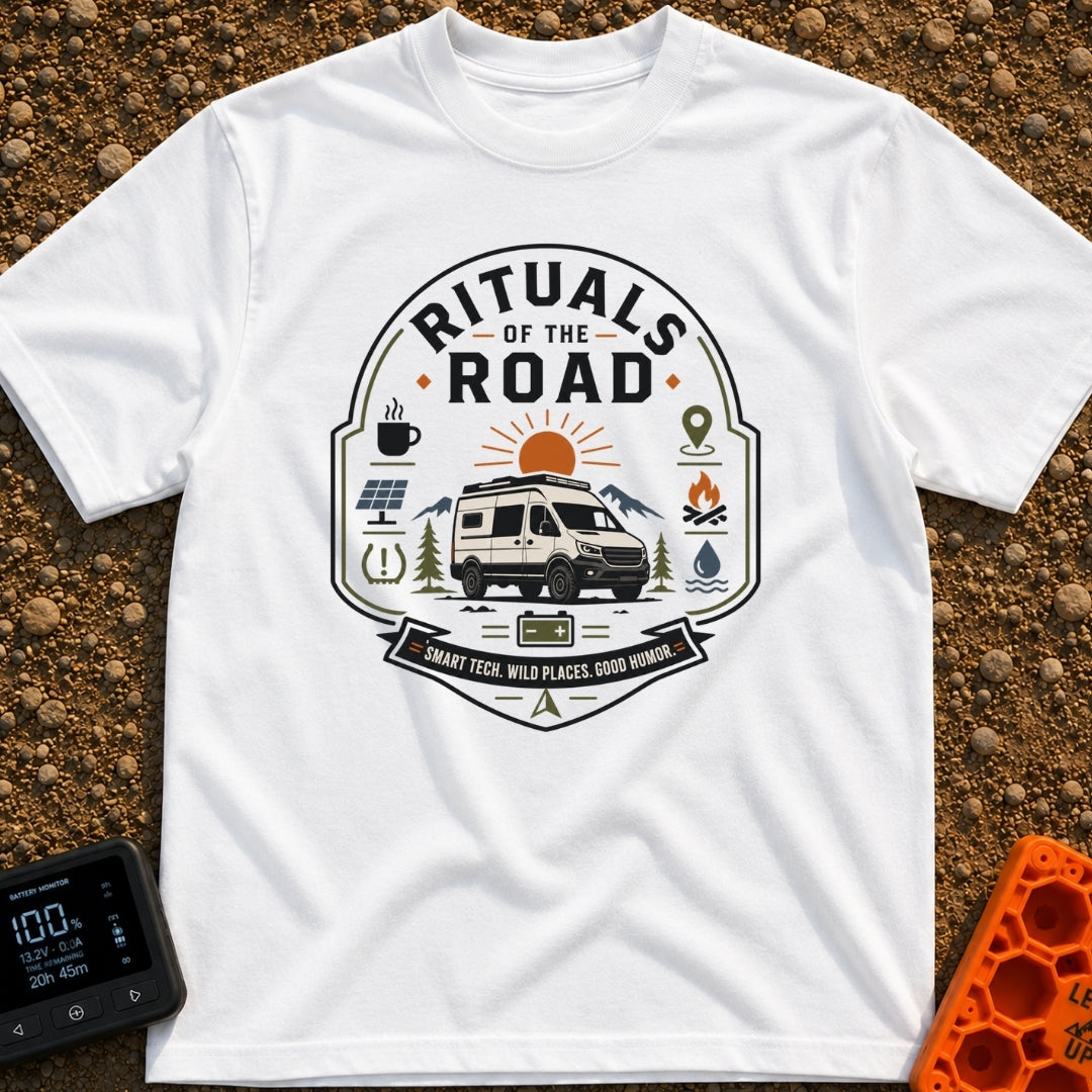 Rituals Of The Road - T-Shirt in White - A crest-style design featuring a white camper van parked in front of a sun and...