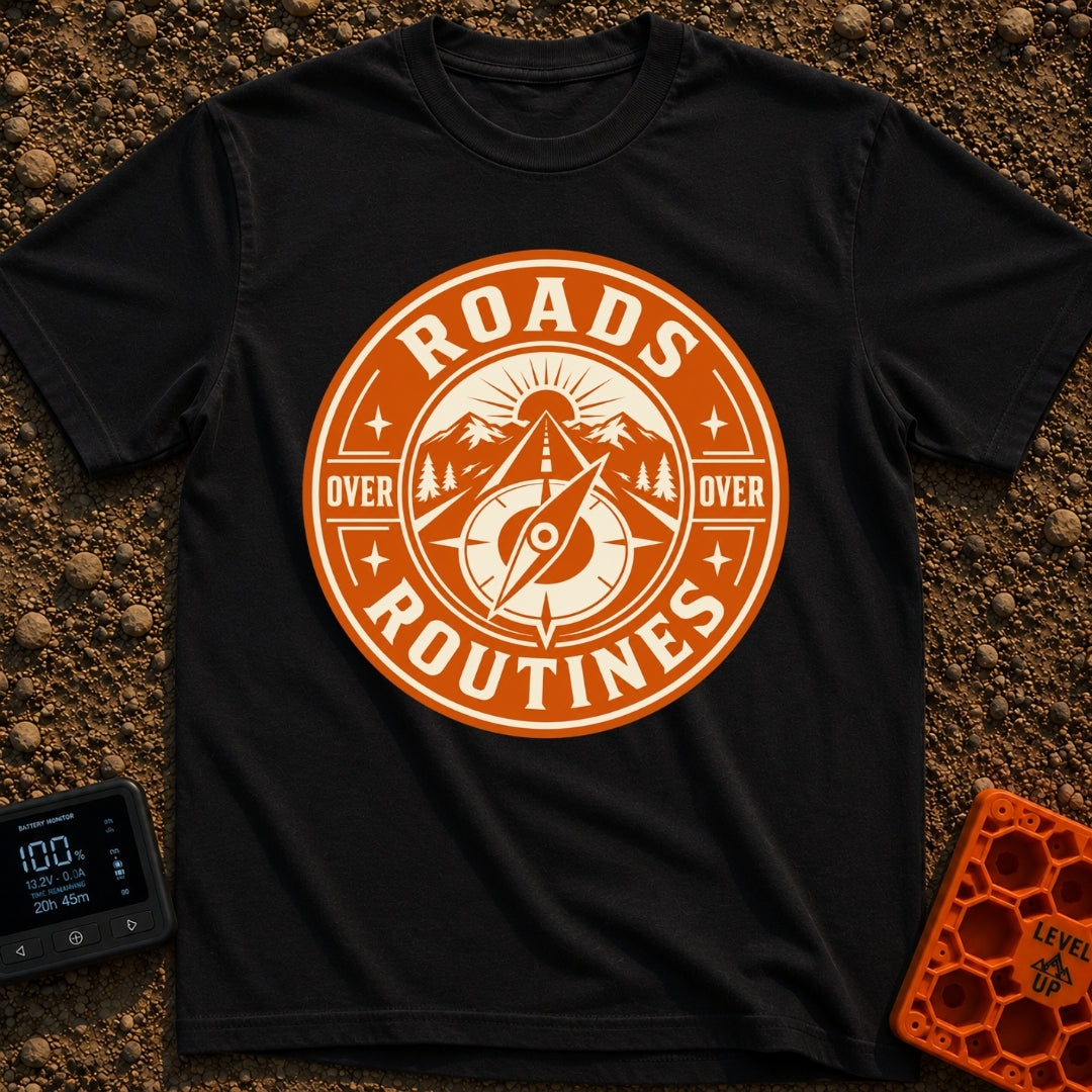 Roads Over Routines - T-Shirt in Black - A circular, orange and cream badge design featuring a straight highway leading...