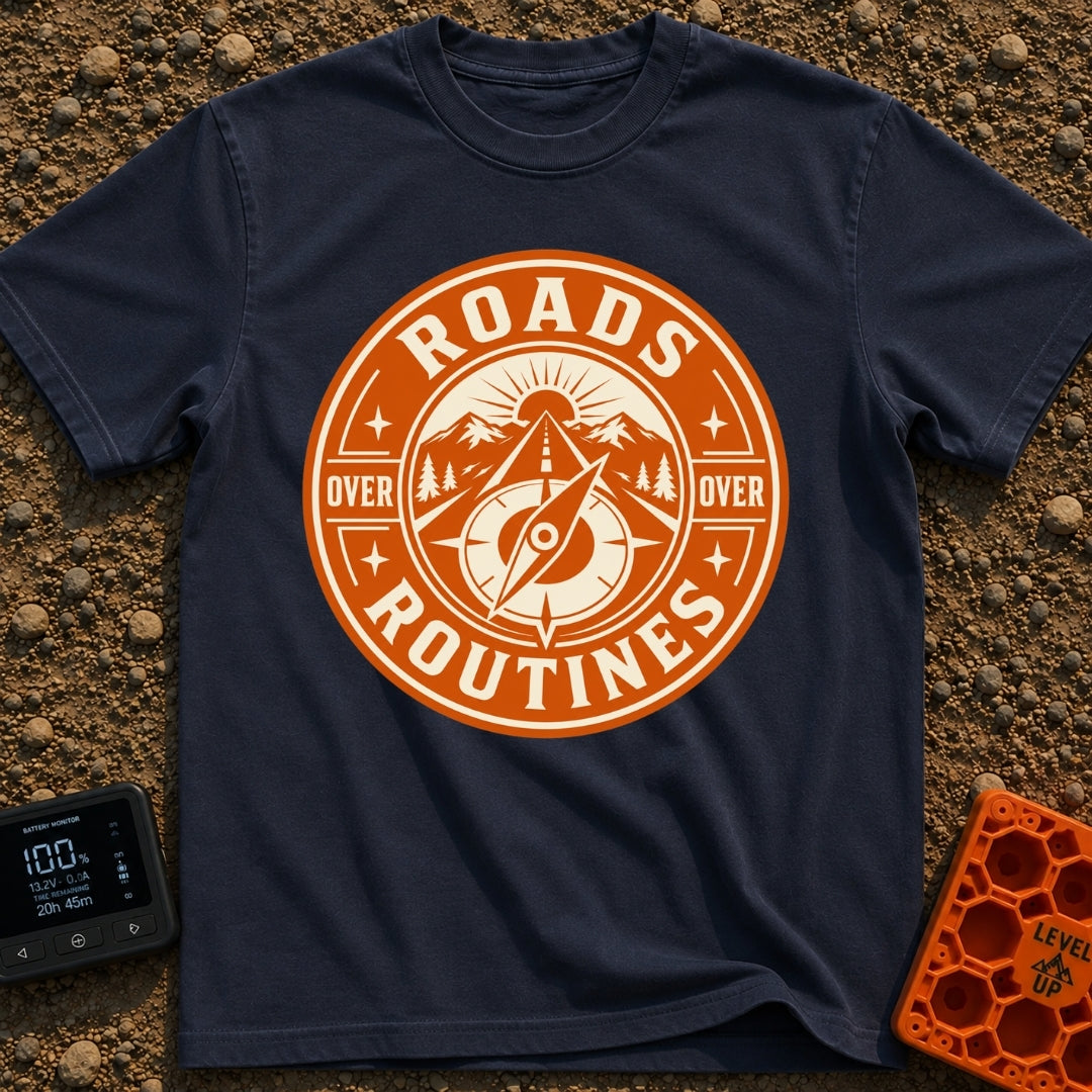 Roads Over Routines - T-Shirt in Navy - A circular, orange and cream badge design featuring a straight highway leading...