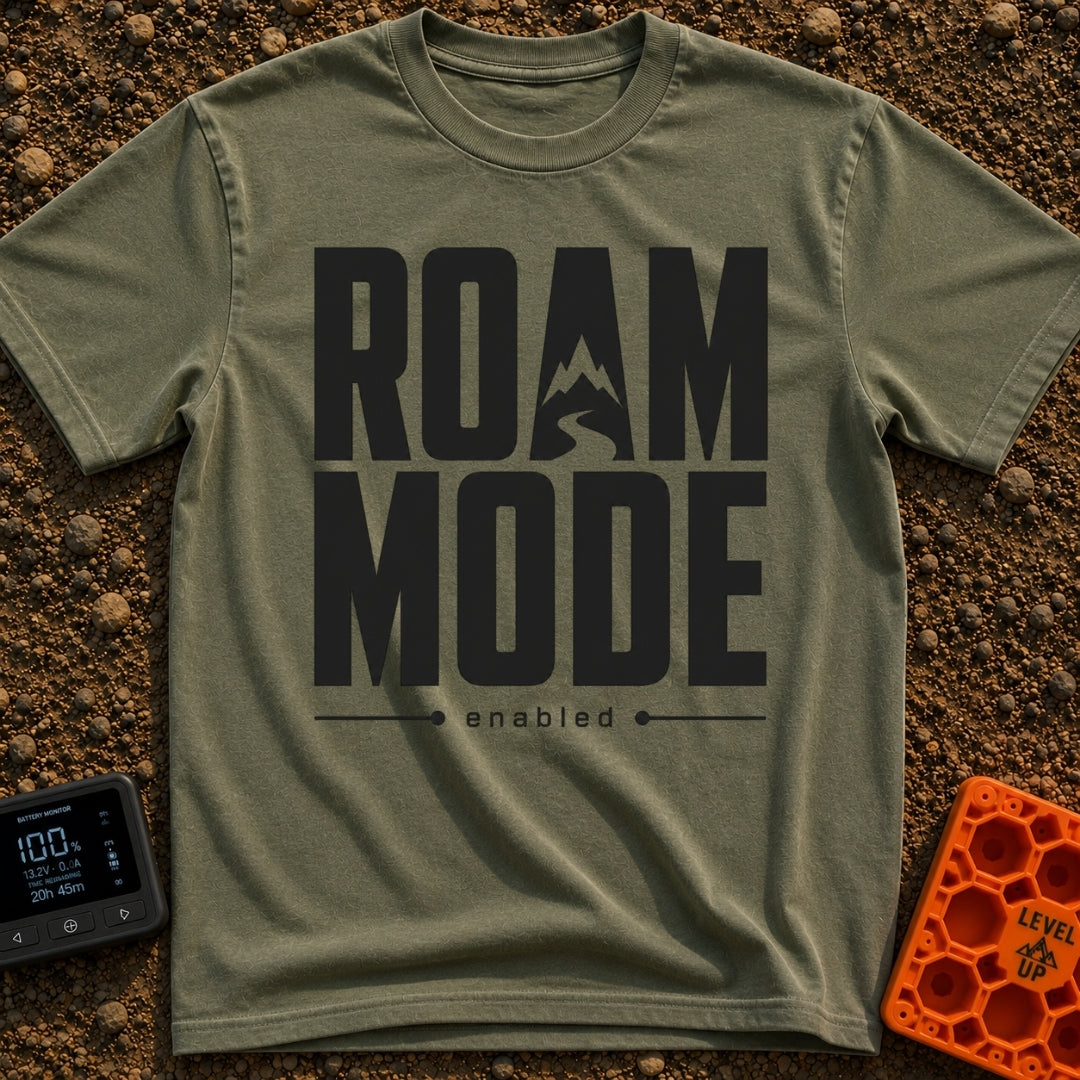 Stuck In Roam Mode - T-Shirt in Moss - Large, bold black text spelling out "ROAM MODE" stacked on two lines, with the...