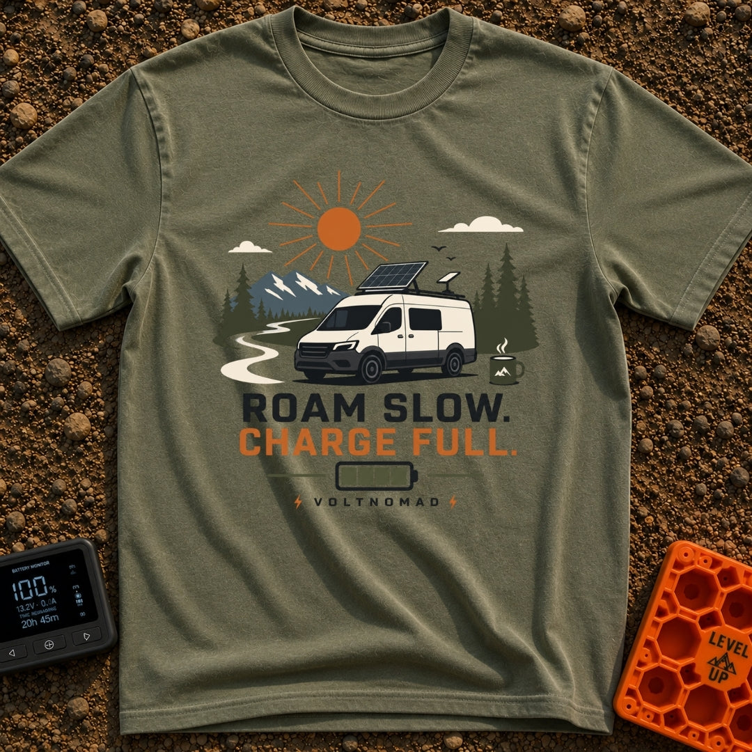 Slow Down Charge Up - T-Shirt in Moss - A white camper van with a tilted roof-mounted solar panel and satellite dish is...