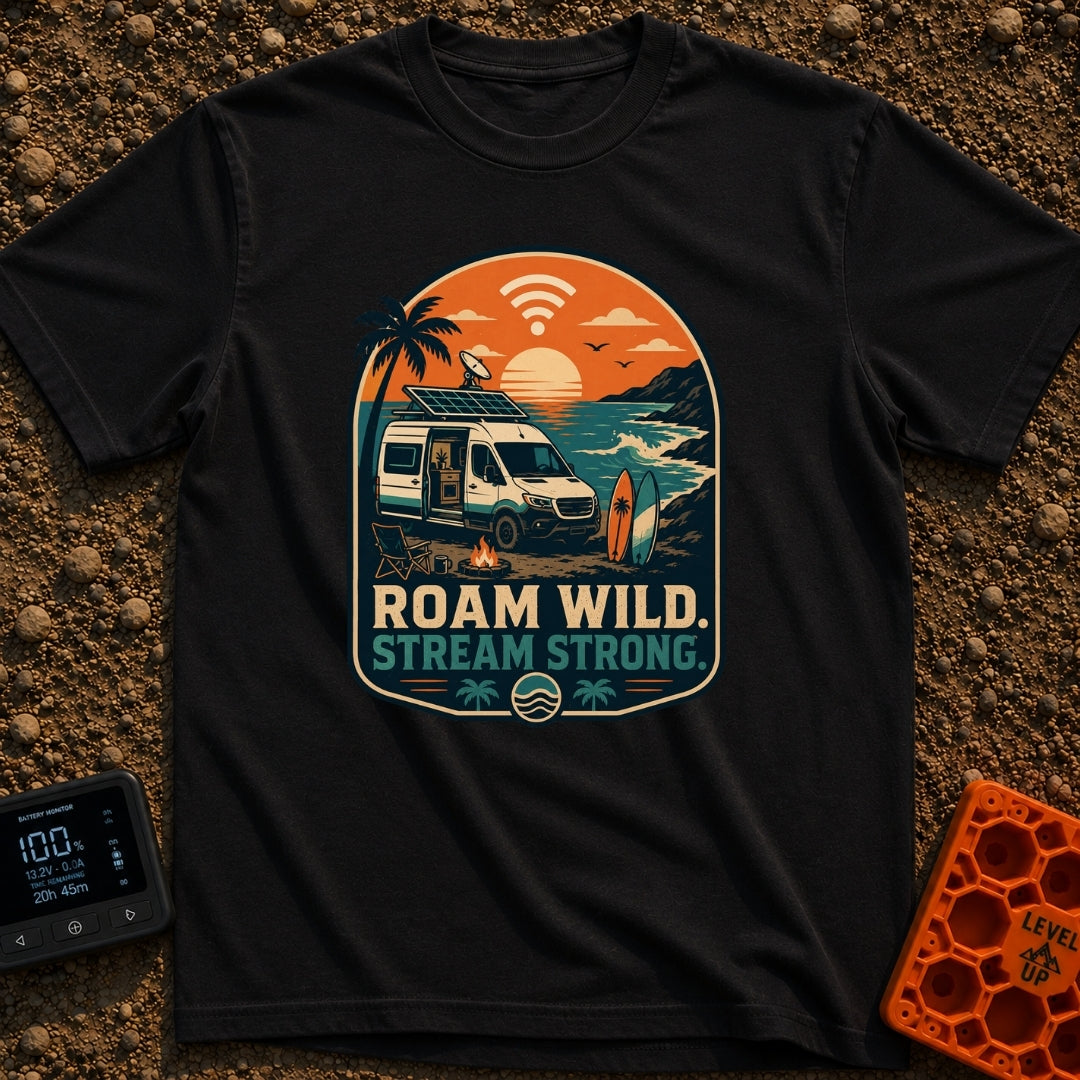 Off Grid Online - T-Shirt in Black - A graphic illustration of a camper van parked on a beach at sunset with a prominent...