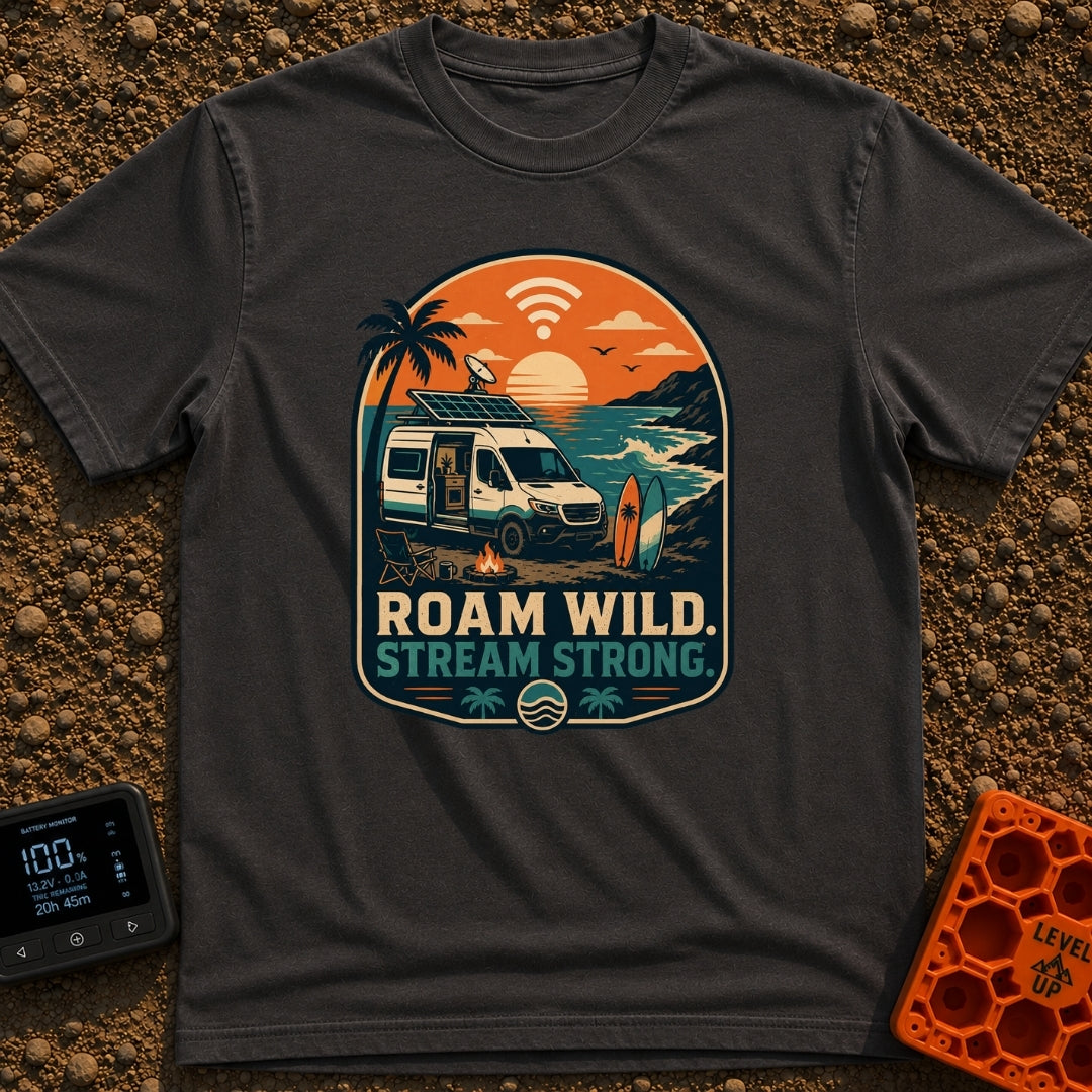 Off Grid Online - T-Shirt in Graphite - A graphic illustration of a camper van parked on a beach at sunset with a...