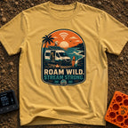 Off Grid Online - T-Shirt in Mustard - A graphic illustration of a camper van parked on a beach at sunset with a...