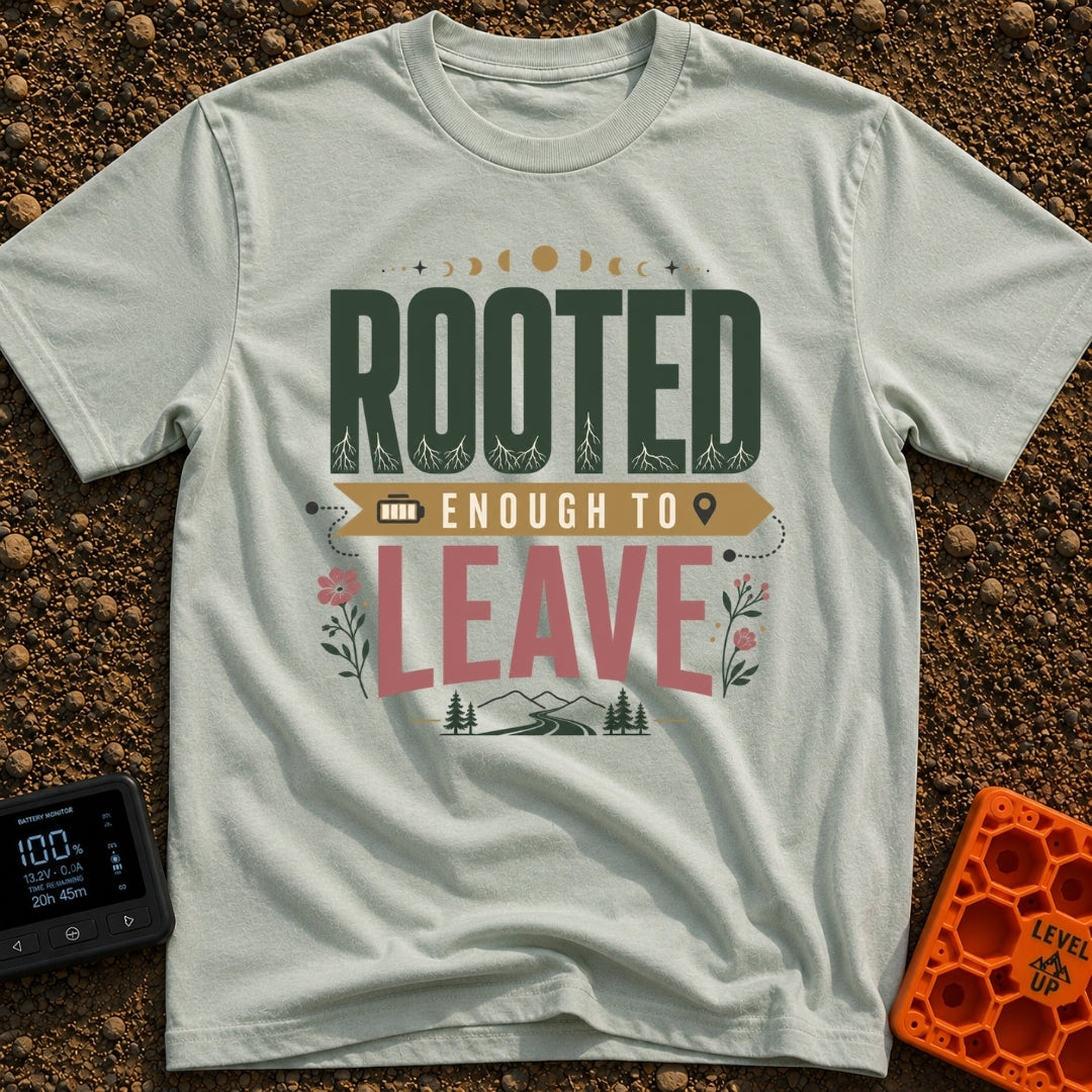 Rooted Yet Roaming - T-Shirt in Bay - A typographic design reading "ROOTED ENOUGH TO LEAVE" with roots drawn inside the...