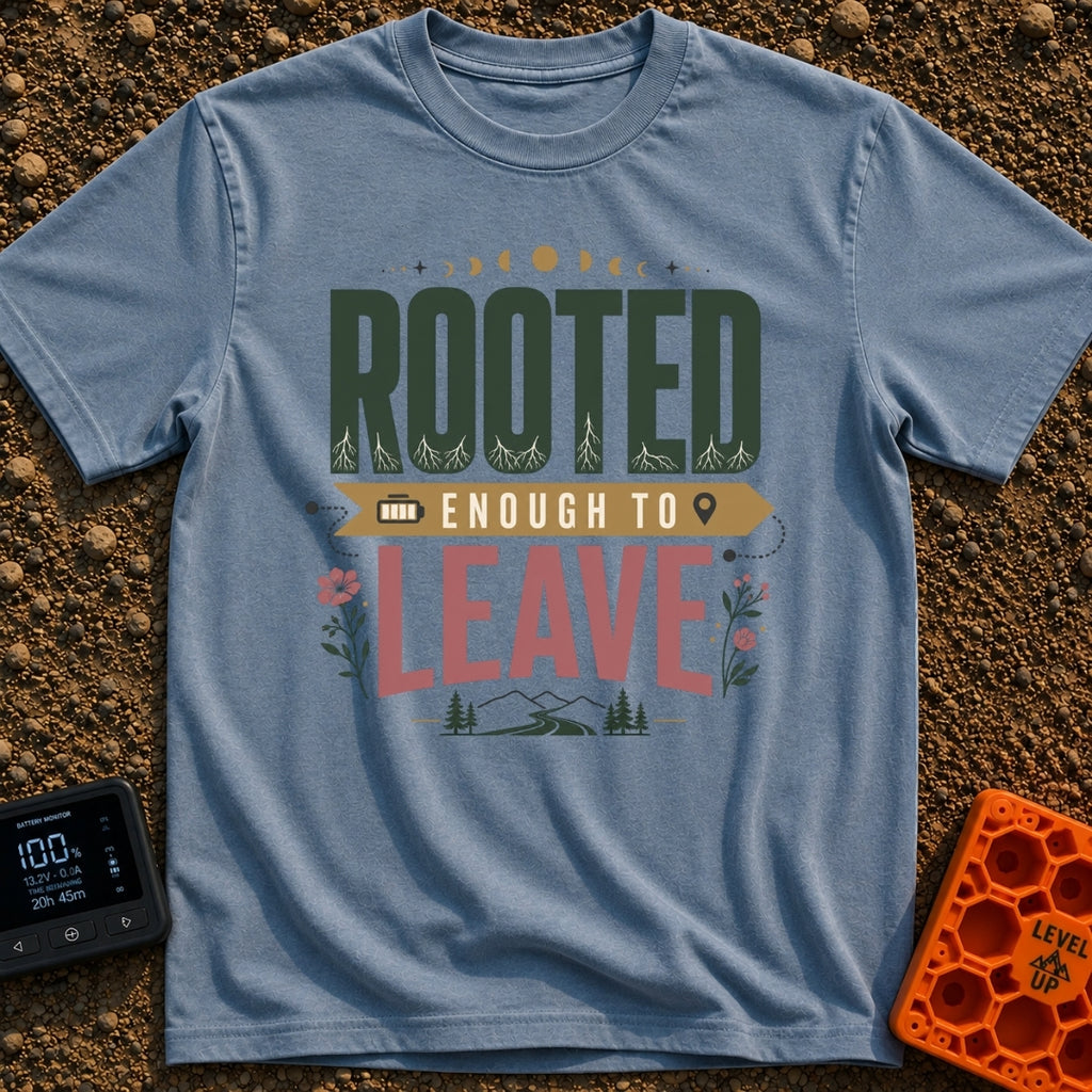 Rooted Yet Roaming - T-Shirt in Blue Jean - A typographic design reading "ROOTED ENOUGH TO LEAVE" with roots drawn inside...