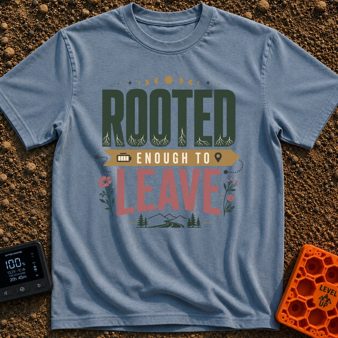 Rooted Yet Roaming - T-Shirt in Blue Jean - A typographic design reading "ROOTED ENOUGH TO LEAVE" with roots drawn inside...