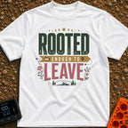 Rooted Yet Roaming - T-Shirt in White - A typographic design reading "ROOTED ENOUGH TO LEAVE" with roots drawn inside the...