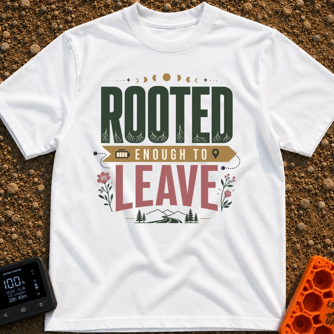 Rooted Yet Roaming - T-Shirt in White - A typographic design reading "ROOTED ENOUGH TO LEAVE" with roots drawn inside the...