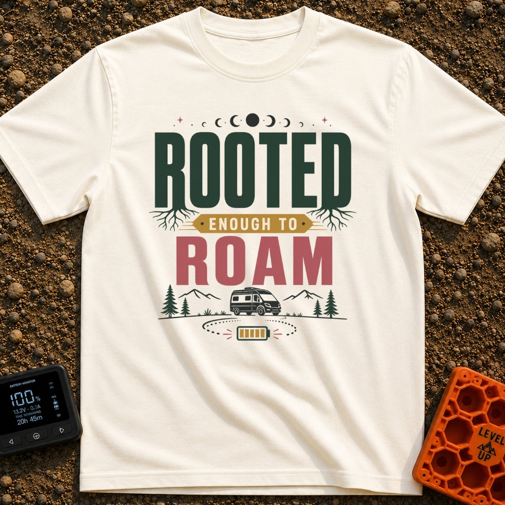 Rooted To Roam - T-Shirt in Ivory - The design features the text "ROOTED ENOUGH TO ROAM" with tree roots growing from the...