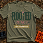 Paws Rooted And Ready - T-Shirt in Moss - The design features the text "ROOTED", "READY", and "PET-ACCOMPANIED" with the...
