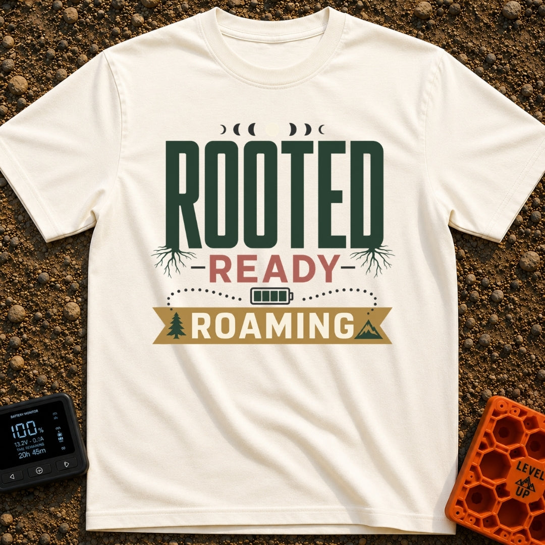 Rooted To Roam - T-Shirt in Ivory - A typographic design reading "ROOTED", "READY", and "ROAMING" stacked vertically. The...