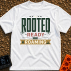 Rooted To Roam - T-Shirt in White - A typographic design reading "ROOTED", "READY", and "ROAMING" stacked vertically. The...