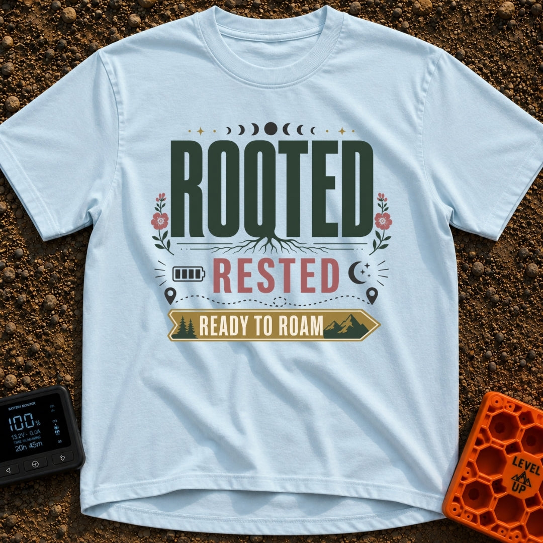 Rooted Ready To Roam - T-Shirt in Chambray - A typographic design featuring the word "ROOTED" with tree roots growing...