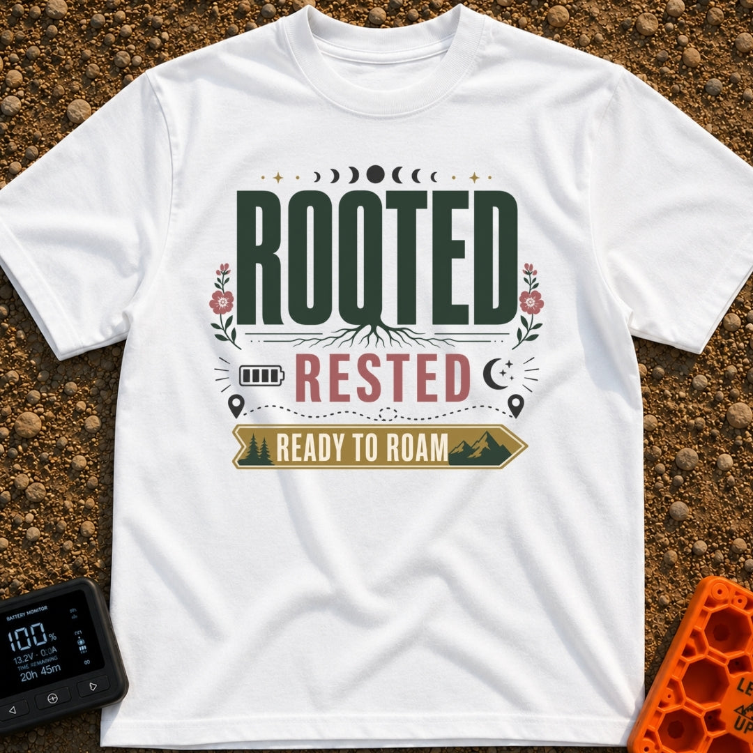 Rooted Ready To Roam - T-Shirt in White - A typographic design featuring the word "ROOTED" with tree roots growing from...