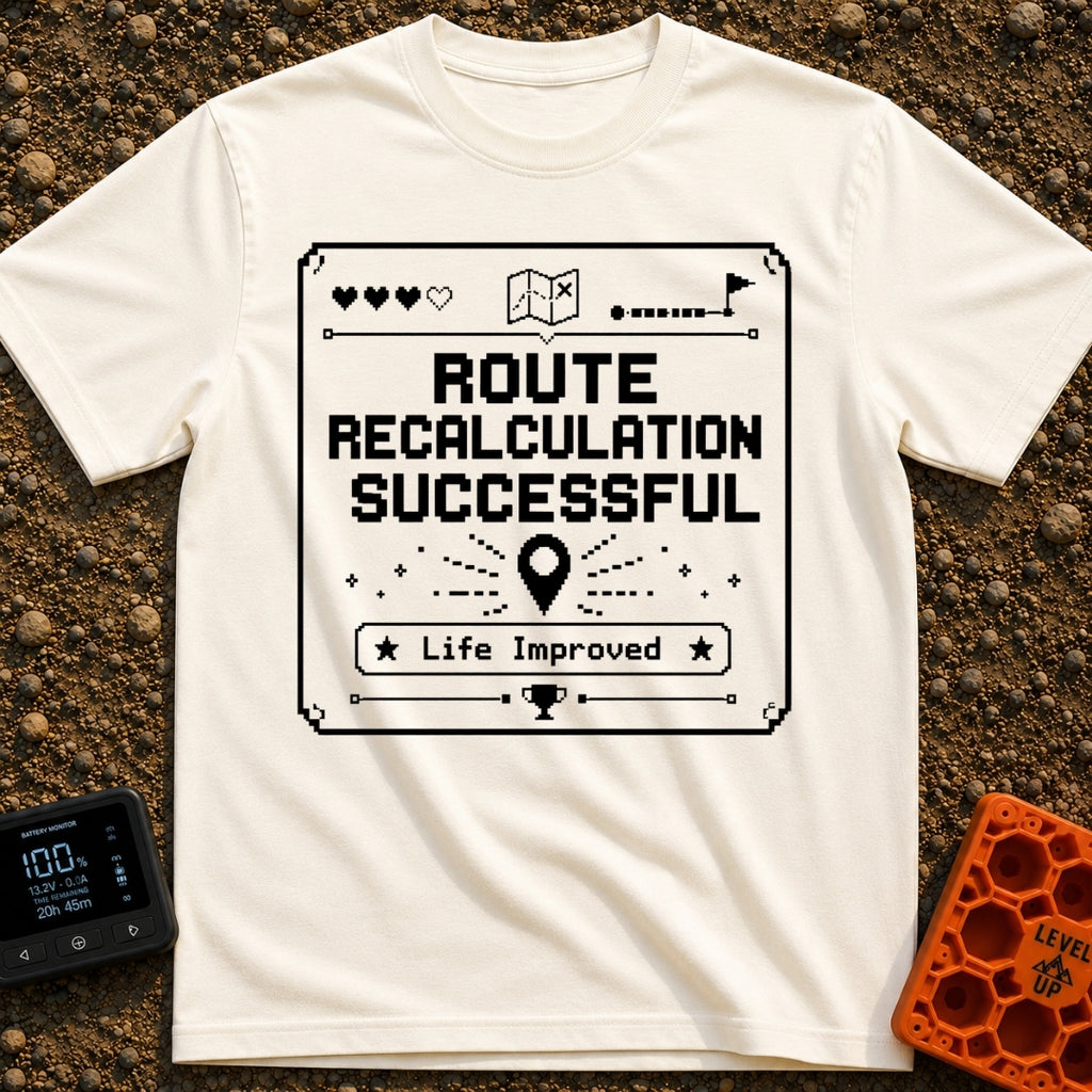 New Route Unlocked - T-Shirt in Ivory - A black and white pixel-art style graphic featuring the text "ROUTE RECALCULATION...