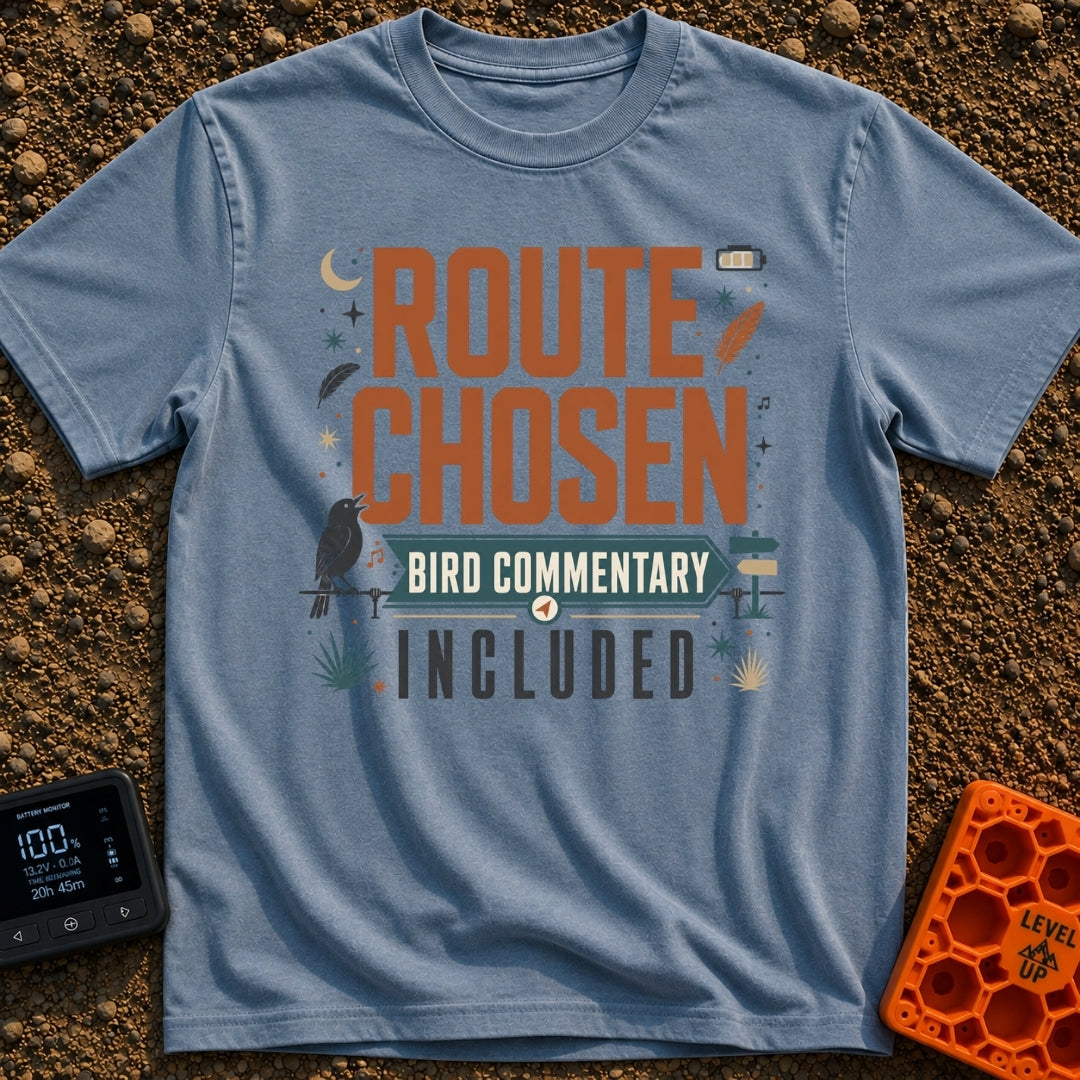 Bird Commentary Included - T-Shirt in Blue Jean - A typographic design reading "ROUTE CHOSEN BIRD COMMENTARY INCLUDED"...