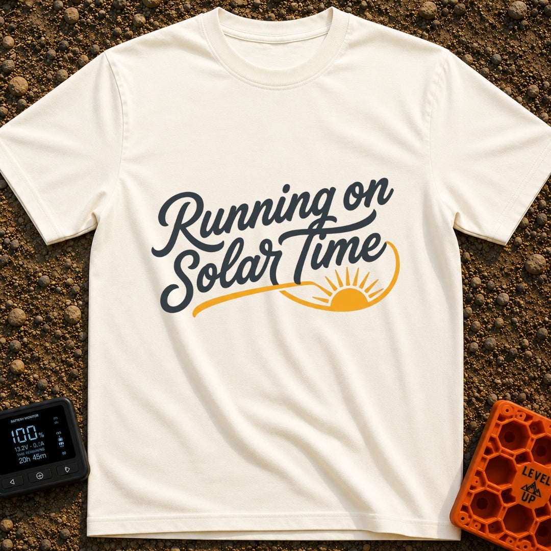 Running On Solar Time - T-Shirt in Ivory - A typographical design featuring the cursive text "Running on Solar Time" in...
