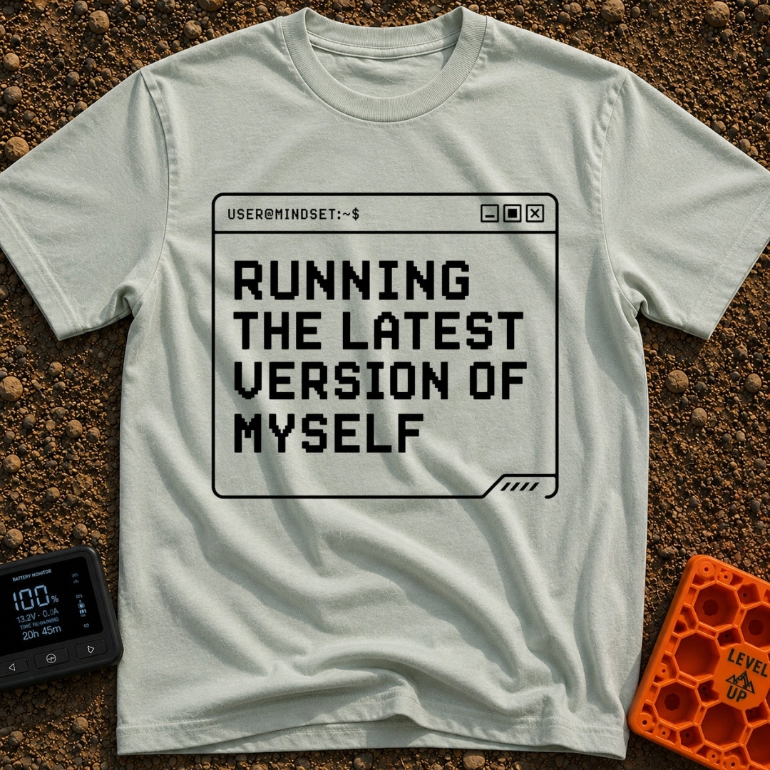 Running My Latest Version - T-Shirt in Bay - A black-and-white graphic of a computer terminal window with the header...
