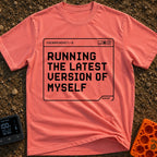 Running My Latest Version - T-Shirt in Watermelon - A black-and-white graphic of a computer terminal window with the...