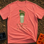 Running My Latest Version - T-Shirt in Watermelon - A graphic of a green bare footprint where the heel and arch area is...