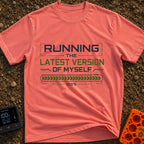 Fully Updated Me - T-Shirt in Watermelon - A text-based design featuring the phrase 'RUNNING THE LATEST VERSION OF...
