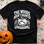 Scariest Carving Ever - T-Shirt in Black - A distressed white graphic featuring the text "THE WOODS AREN'T HAUNTED" above...