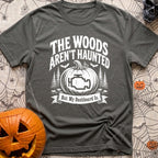 Scariest Carving Ever - T-Shirt in Pepper - A distressed white graphic featuring the text "THE WOODS AREN'T HAUNTED"...