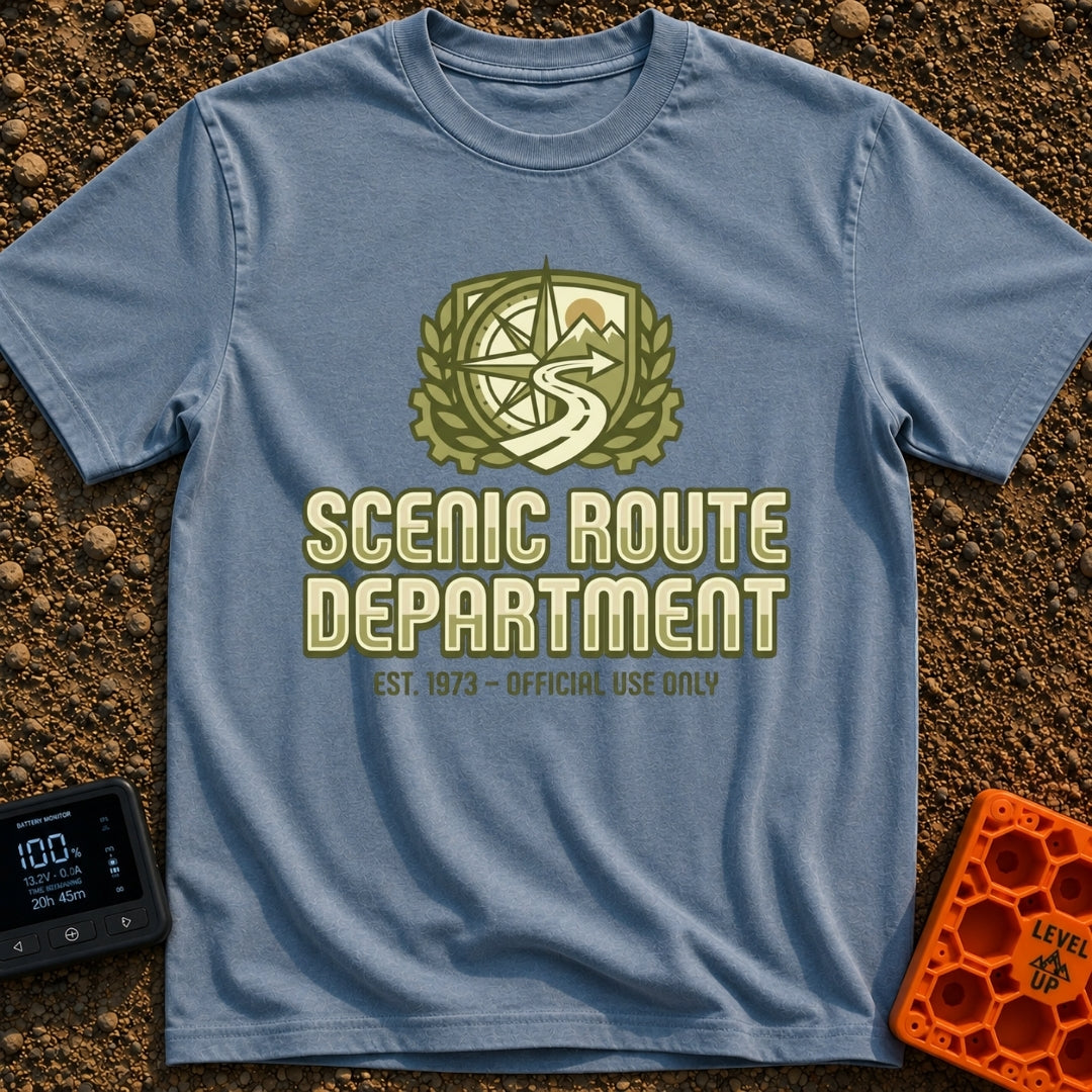 Scenic Route Authority - T-Shirt in Blue Jean - An olive green crest graphic featuring a compass, mountains, a sun, and a...